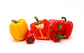 Composition of several types of sweet pepper of different shapes, colors and sizes on a light background. Natural product. Natural color. Close-up.