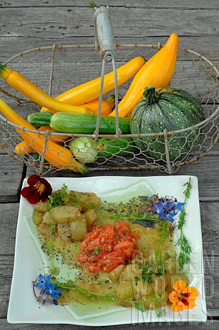 Yellow_green_and_round_courgettes_in_a_basket__Plate_containing_a_dish_of_melting_courgettes_with_co