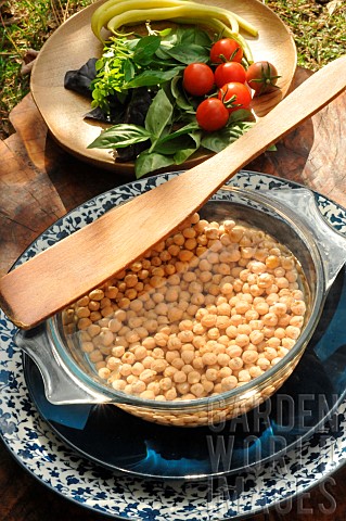 Chick_pea_Cicer_arietinum_peas_soaking_in_water_before_cooking_and_seasonal_vegetables