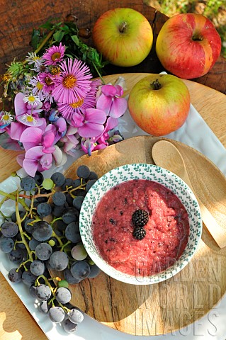 Seasonal_fruit_apples_bunches_of_grapes_blackberries_and_homemade_compote_a_source_of_vitamins