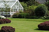 Lawn and greenhouse at Malleny Garden, Scotland