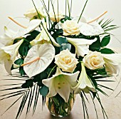 WHITE FLOWERS AND GREEN FOLIAGE FLOWER ARRANGEMENT