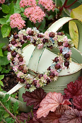 OLD_WATERING_CAN_WITH_WITH_HEART_SHAPE_WREATH__AUTUMN_ARRANGEMENT