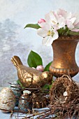 STILL LIFE WITH APPLE BLOSSOMS, GOLD BIRD, NEST AND CERAMIC EGGS