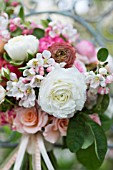MALUS X EVERESTE  SPRING BOUQUET OF PINK ROSES  RANUNCULUS AND APPLE BLOSSOM