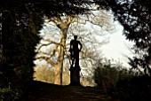 SILHOUETTE OF CLASSICAL STATUE OF YOUNG MAN AT ROUSHAM, OXFORDSHIRE