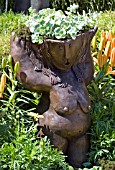 NAKED LADY WITH PLANTED HAIR,  DECORATIVE PLANTER