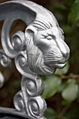 SILVER LION DETAIL ON BENCH