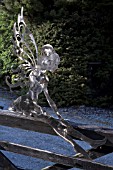 CONTEMPORARY HAND CRAFTED STEEL SCULPTURE OF ANGEL SITTING ON GATE, GARDEN ART, WITHIN CONWY VALLEY MAZE
