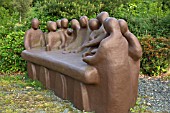 CONTEMPORARY FIBRE GLASS SCULPTURE OF THE LAST SUPPER, GARDEN ART, WITHIN CONWY VALLEY MAZE