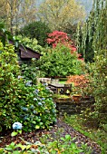 COLOUFUL GARDEN WITH A WIDE VARIETY OF MATURE TREES AND SHRUBS
