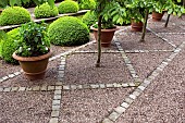 Path design of cobbles and gravel in country garden