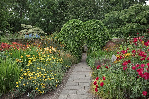 Garden_Room_called_the_Lanhydrock_Garden_with_hot_red_yellows_and_oranges_herbaceous_perennials