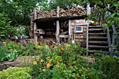 A TRUGMAKERS GARDEN BY SERENA FREMANTLE AND TINA VALLIS AT RHS CHELSEA